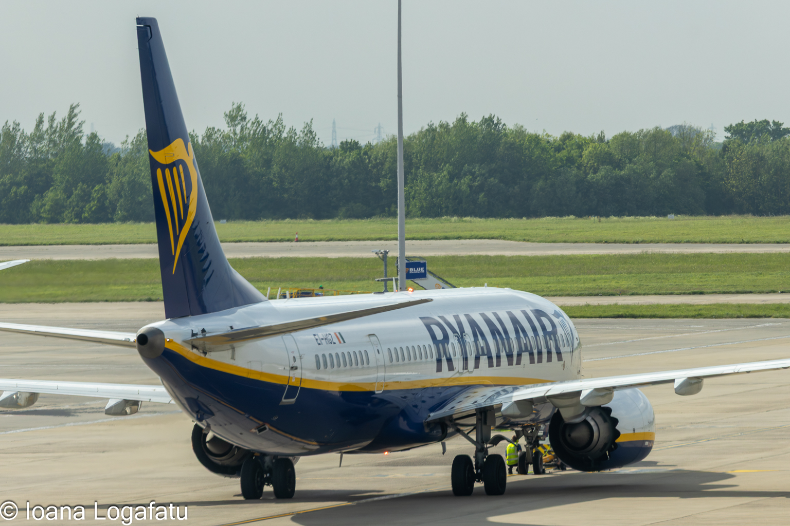 Airplane preparing for departure on a sunny day